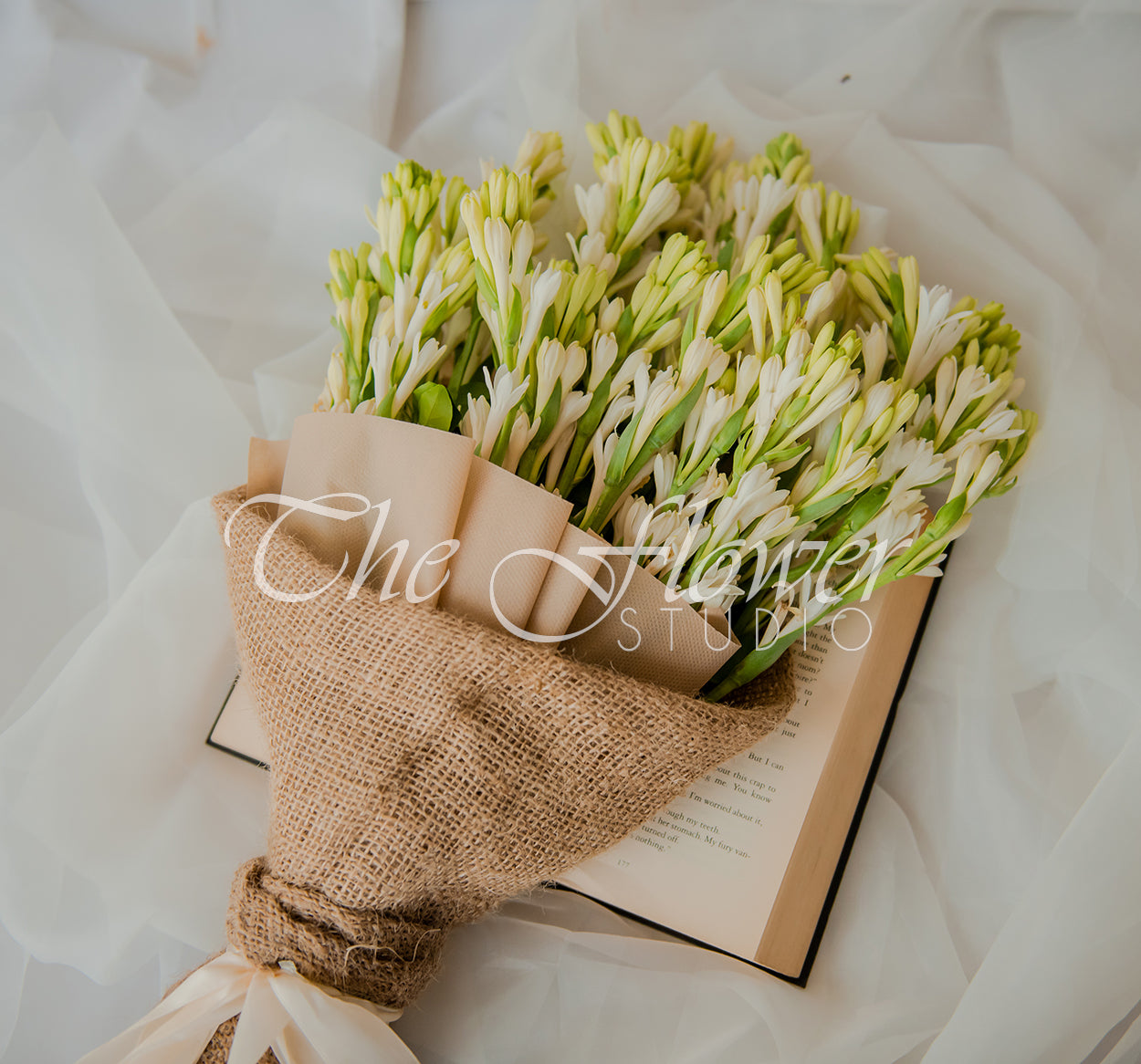 A tuberose bouquet - 36 stems of fresh tuberoses hand-tied beautifully in a jute wrap